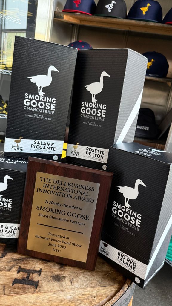 The winning Sliced Charcuterie Packages from Smoking Goose are delivered in a reusable, stand-up retail display.